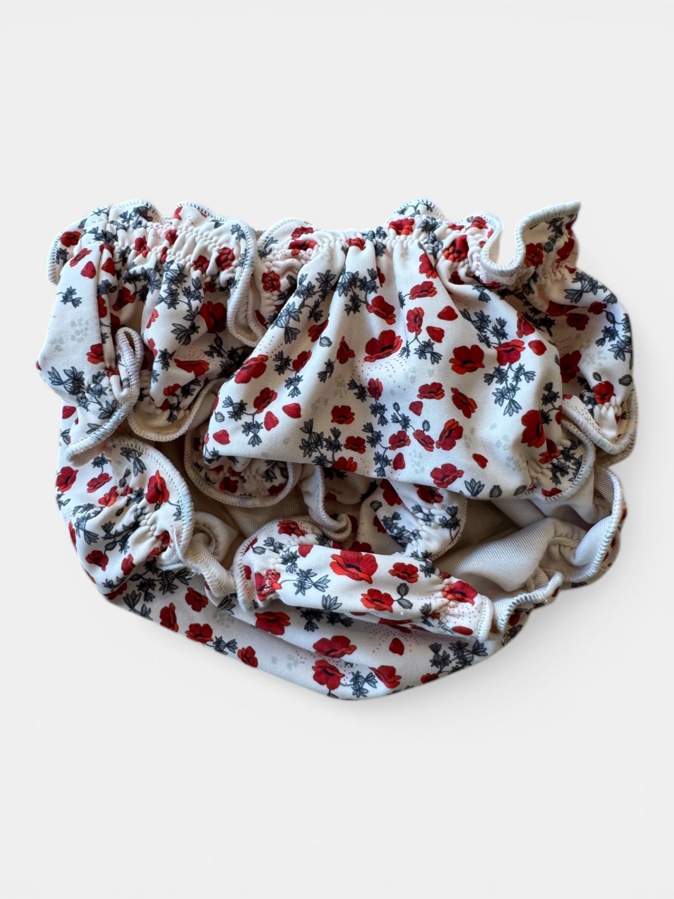 Badeanzug "Poppy" 2-tlg UV-Schutz 50+ Nude mit rot-blauem Blumenmuster Gr.104 | konges sløjd